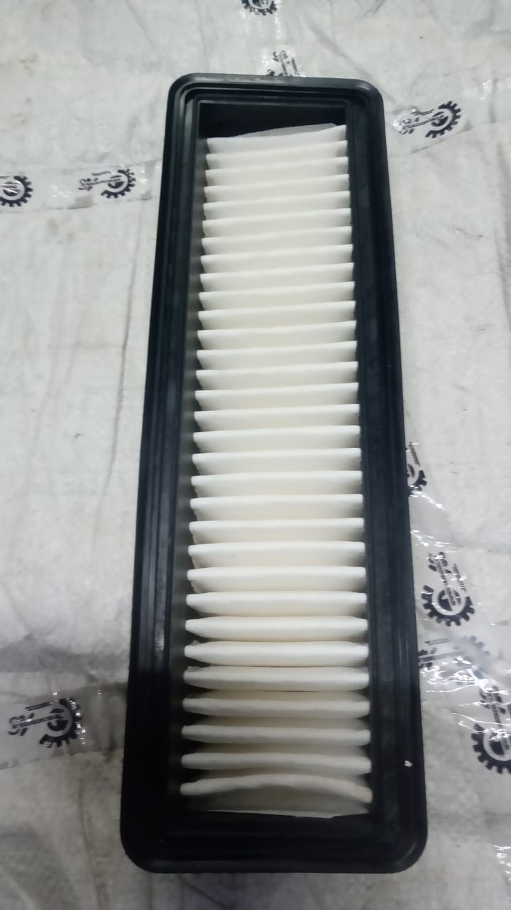 Hyundai Xcent diesel air filter, genuine Hyundai part #28113B4400, installed in a vehicle engine for clean air intake