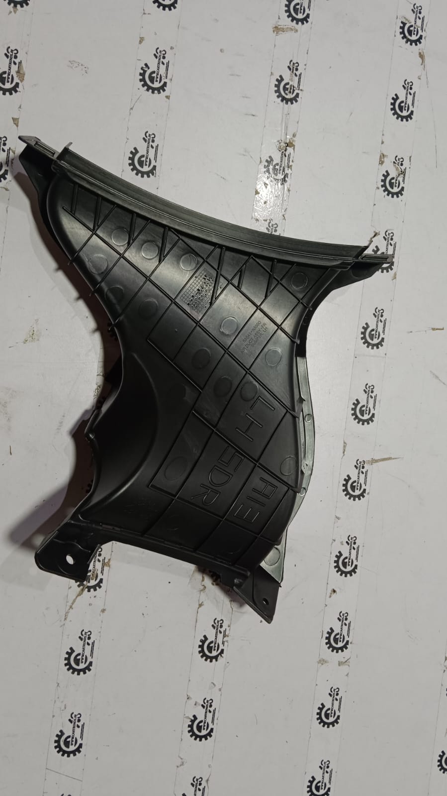 Hyundai Cover for right bumper fog lamp, genuine part 86562K6410, designed for Hyundai vehicles.