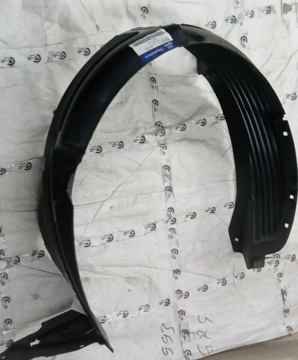 Hyundai I20 Type 2 left side fender lining part, model 868111J500, showing the black plastic wheel arch cover.
