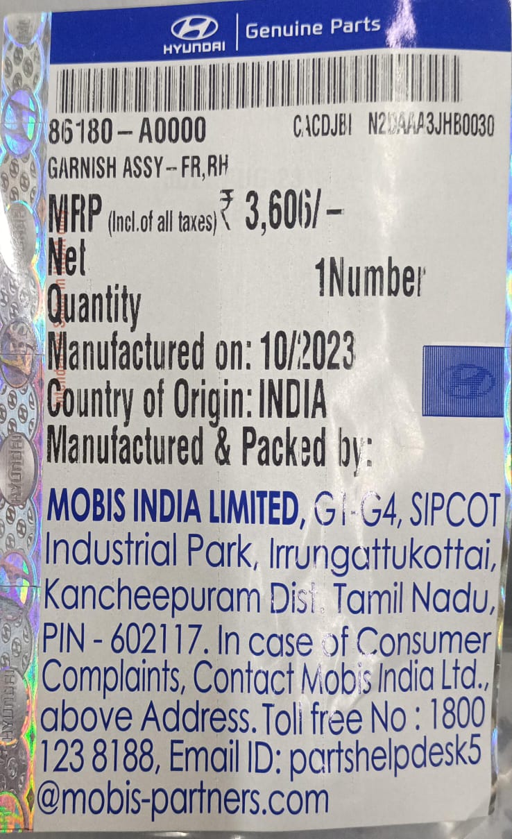 Hyundai Creta front right garnish, automotive trim part with part number 86180A0000, installed on the vehicle's exterior.