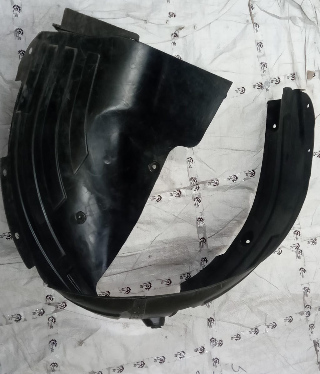 Hyundai Creta right rear fender lining, close-up view showing the black plastic automotive part.