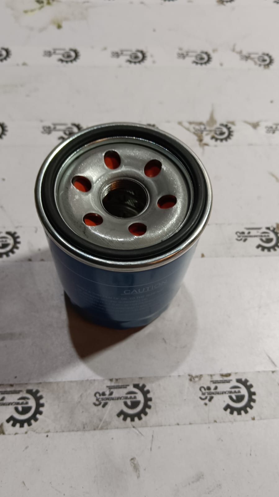 Hyundai oil filter for Santro Xing car, spare parts image showing the replacement filter component.