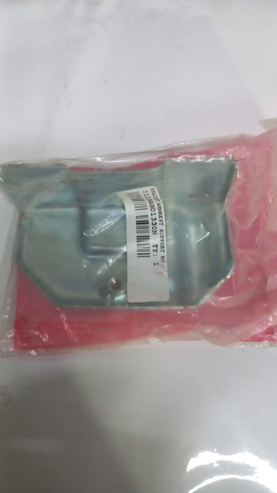 Mahindra RH armrest support bracket, part number 0103AAG01330N, for Mahindra vehicle interior or seat support.