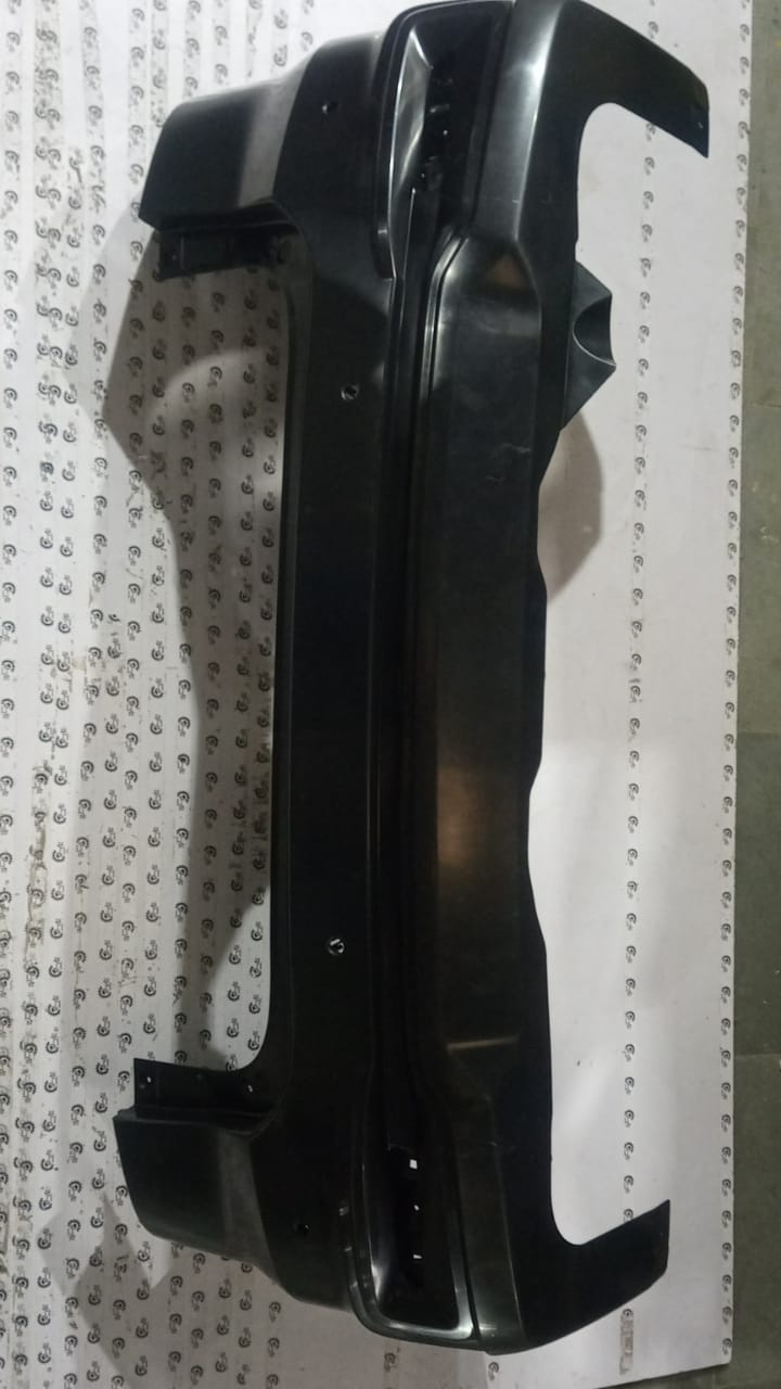Maruti Suzuki rear bumper set for Baleno and Ignis, model #71810M72R105PK, in black with mounting hardware.