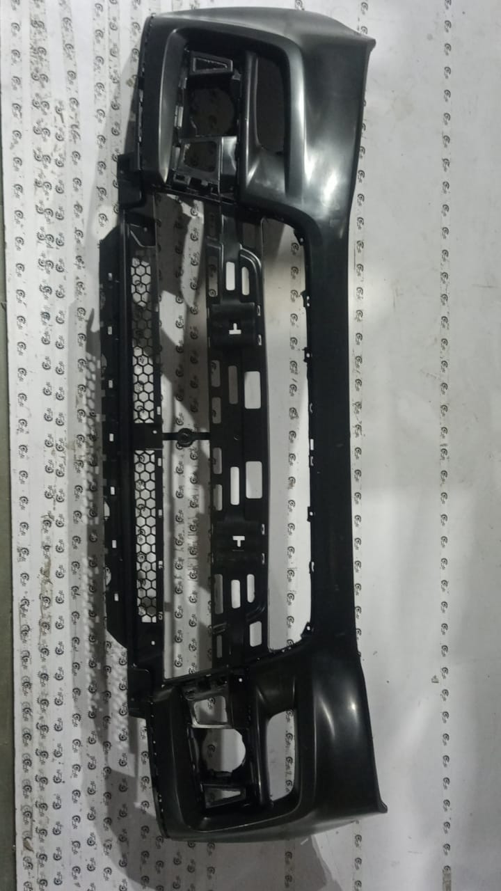 Maruti Suzuki rear upper bumper replacement part, model 71811M82P005PK, shown in a close-up image.