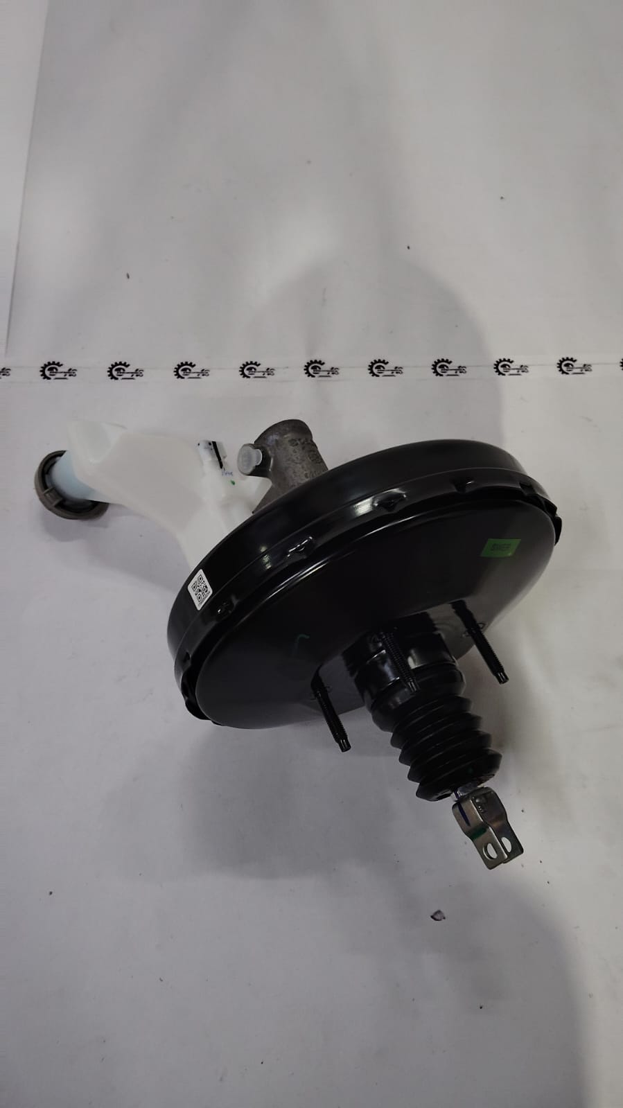 Maruti Suzuki brake master cylinder assembly for Wagon R vehicle, showing the detailed metallic component.