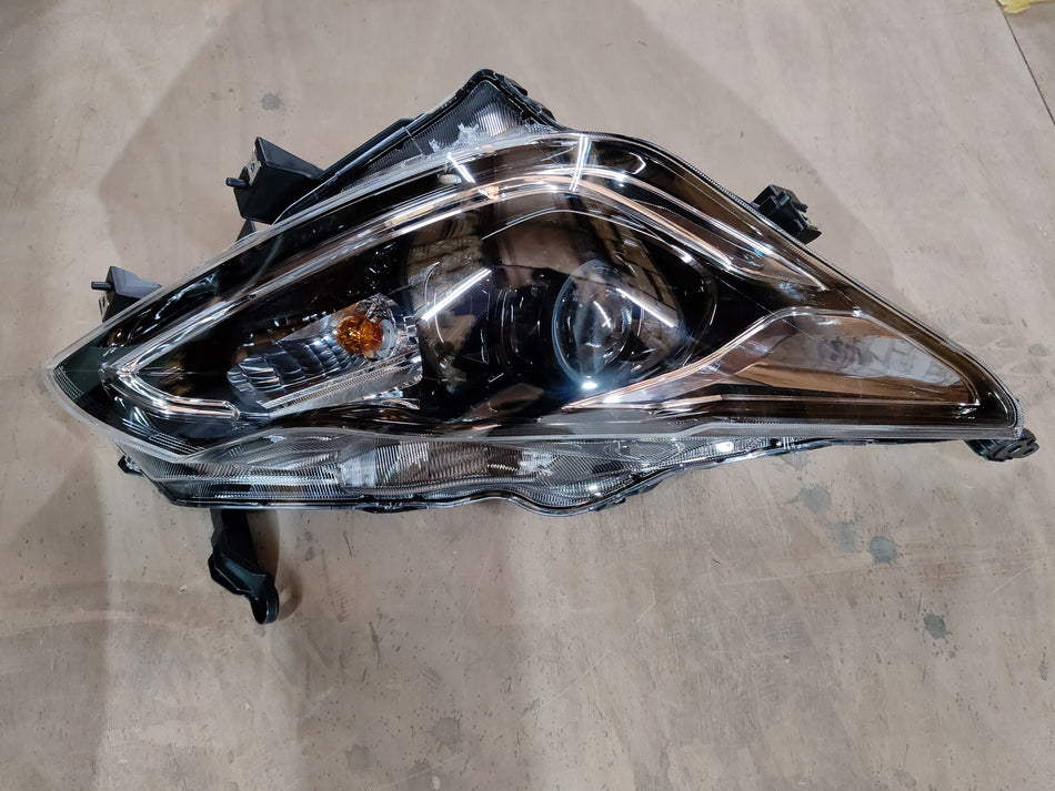 Maruti Suzuki Baleno right headlamp assembly with model number 35100M55T03, showing the vehicle headlight component.