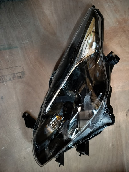 Maruti Suzuki headlamp assembly LH 35300M55T42 showing the front view of the vehicle's left headlight.