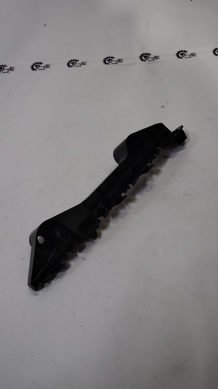 Maruti Suzuki Swift front bumper right holder, car part for vehicle bumper repair and replacement.