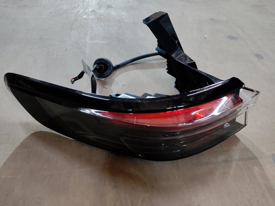 Maruti Suzuki tail and stop lamp assembly showing the rear vehicle lighting component for Maruti Suzuki cars.