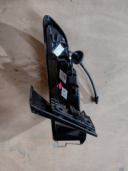 Maruti Suzuki tail and stop lamp assembly, part number 35802M76T01, showing the vehicle's rear lighting component.