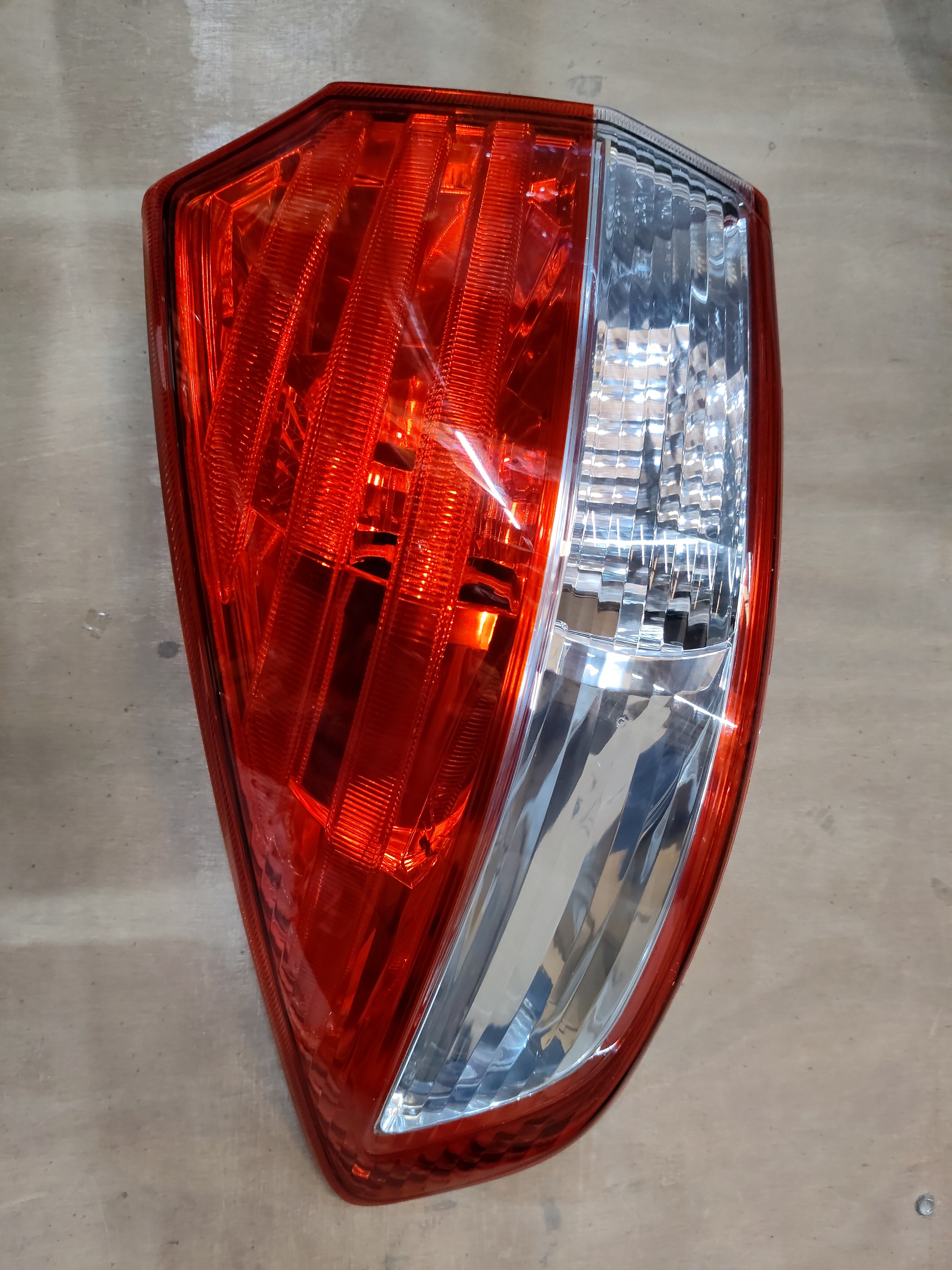 Rear left combination lamp unit for Maruti Suzuki Ciaz, model 35750M79M01, showing the tail light and turn signal assembly.
