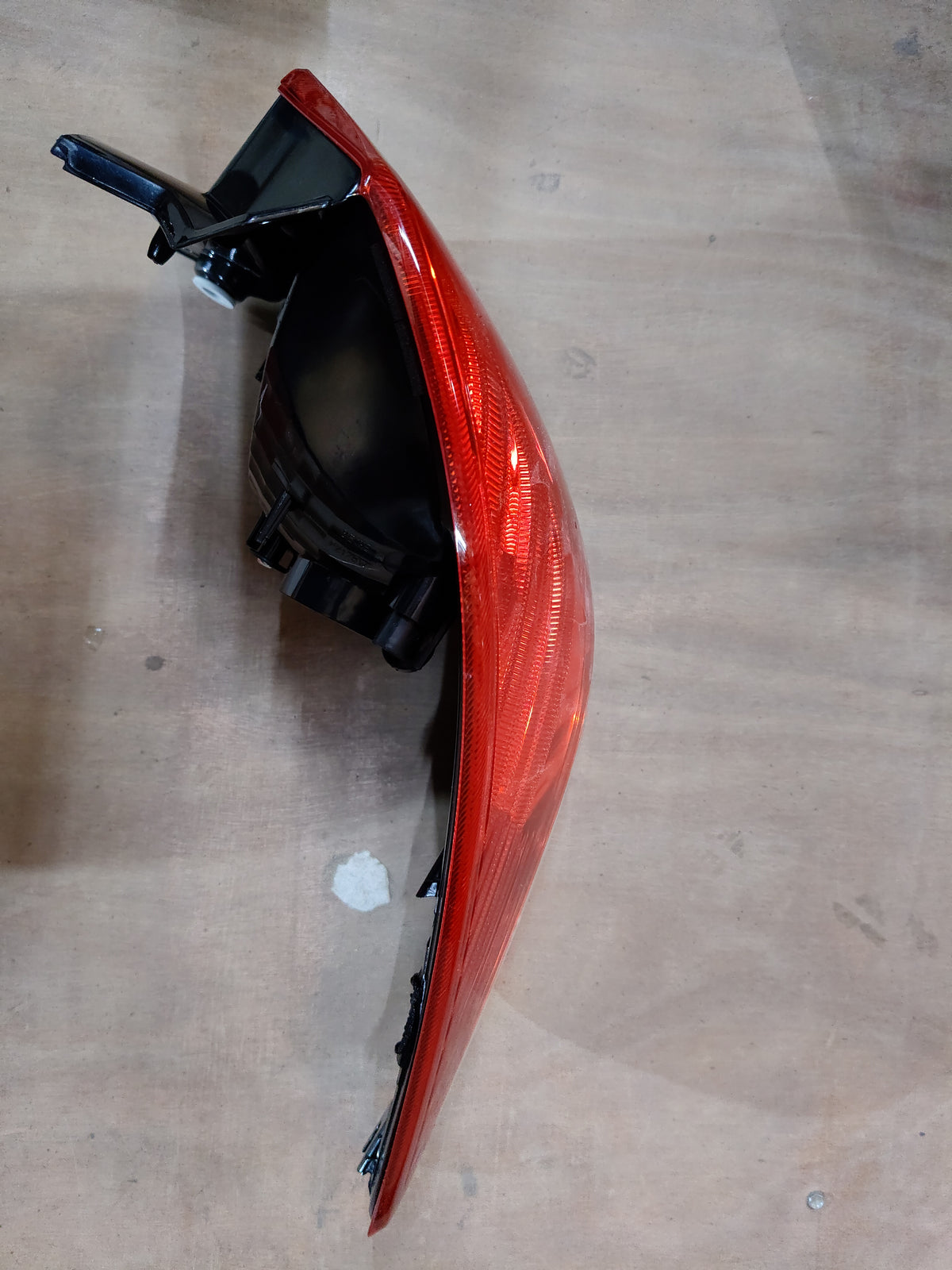Rear left lamp unit for Maruti Suzuki Ciaz, model 35750M79M01, showcasing the rear combination light assembly.