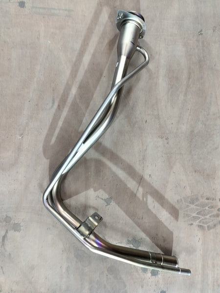 Maruti Suzuki Neck Compfuel Filler 89210M62S00 showing the fuel filler neck and surrounding area of the vehicle