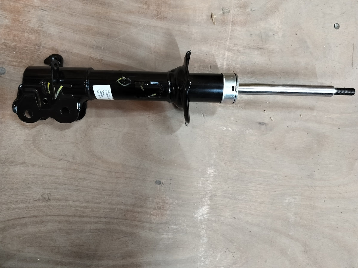 Front left strut assembly for Maruti Suzuki vehicle, part number 41602M66R00 with visible shock absorber and mounting components.