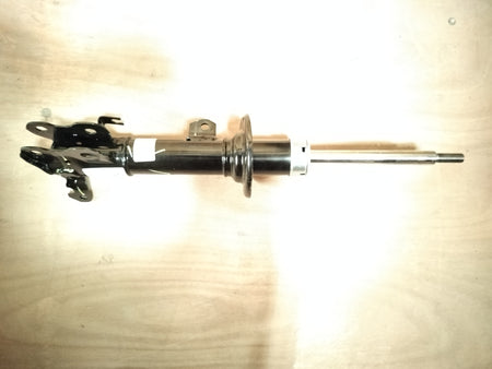 Front left suspension strut assembly for Maruti Suzuki vehicle, part number 41602M66R00, shown in the image.