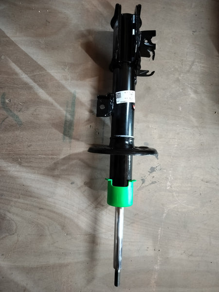 Maruti Suzuki front strut assembly with spring for suspension system, part number 41602M85S00.
