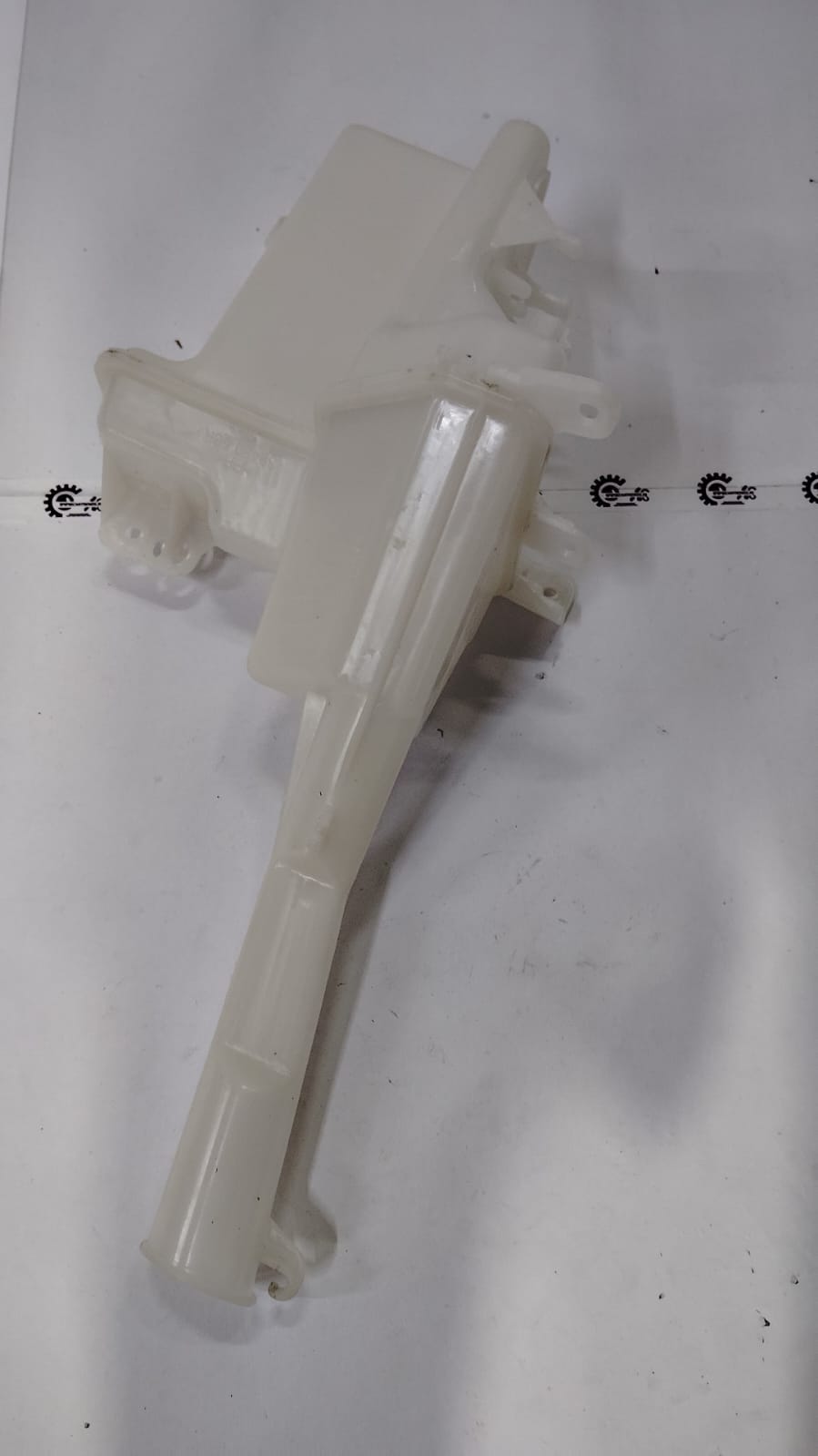Maruti Suzuki tank assembly washer for Dzire, part number 38450M56R00, shown in close-up view of the vehicle component.