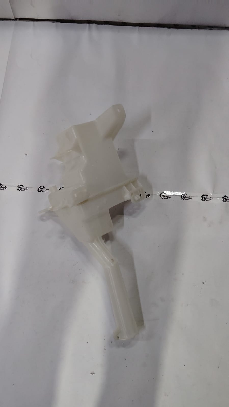 Maruti Suzuki tank assembly washer for Dzire model, part number 38450M56R00, showing the metal washer component.