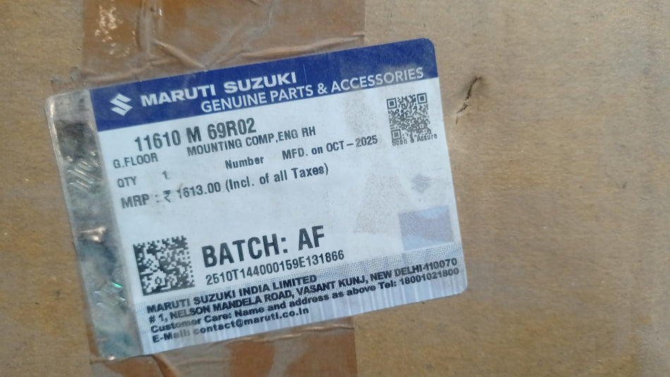 Maruti Suzuki vehicle part labeled 11610M69R02, likely a mechanical component, with a close-up view of the part's surface and details.