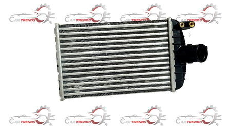 Maruti Suzuki intercooler for Baleno Type 1 Diesel, shown mounted on engine, with metal fins and hoses visible.