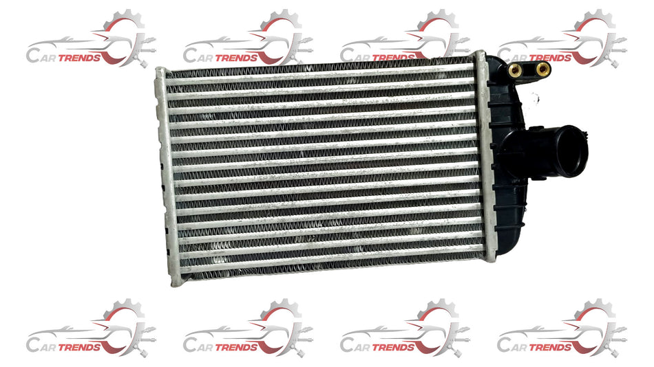 Maruti Suzuki intercooler for Baleno Type 1 Diesel, shown mounted on engine, with metal fins and hoses visible.