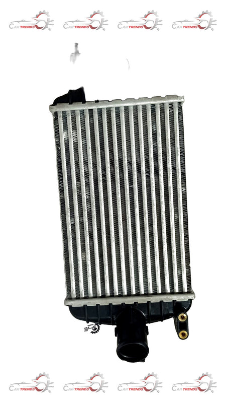 Maruti Suzuki Baleno Type 1 diesel intercooler, showing its metal core and mounting brackets for engine cooling.