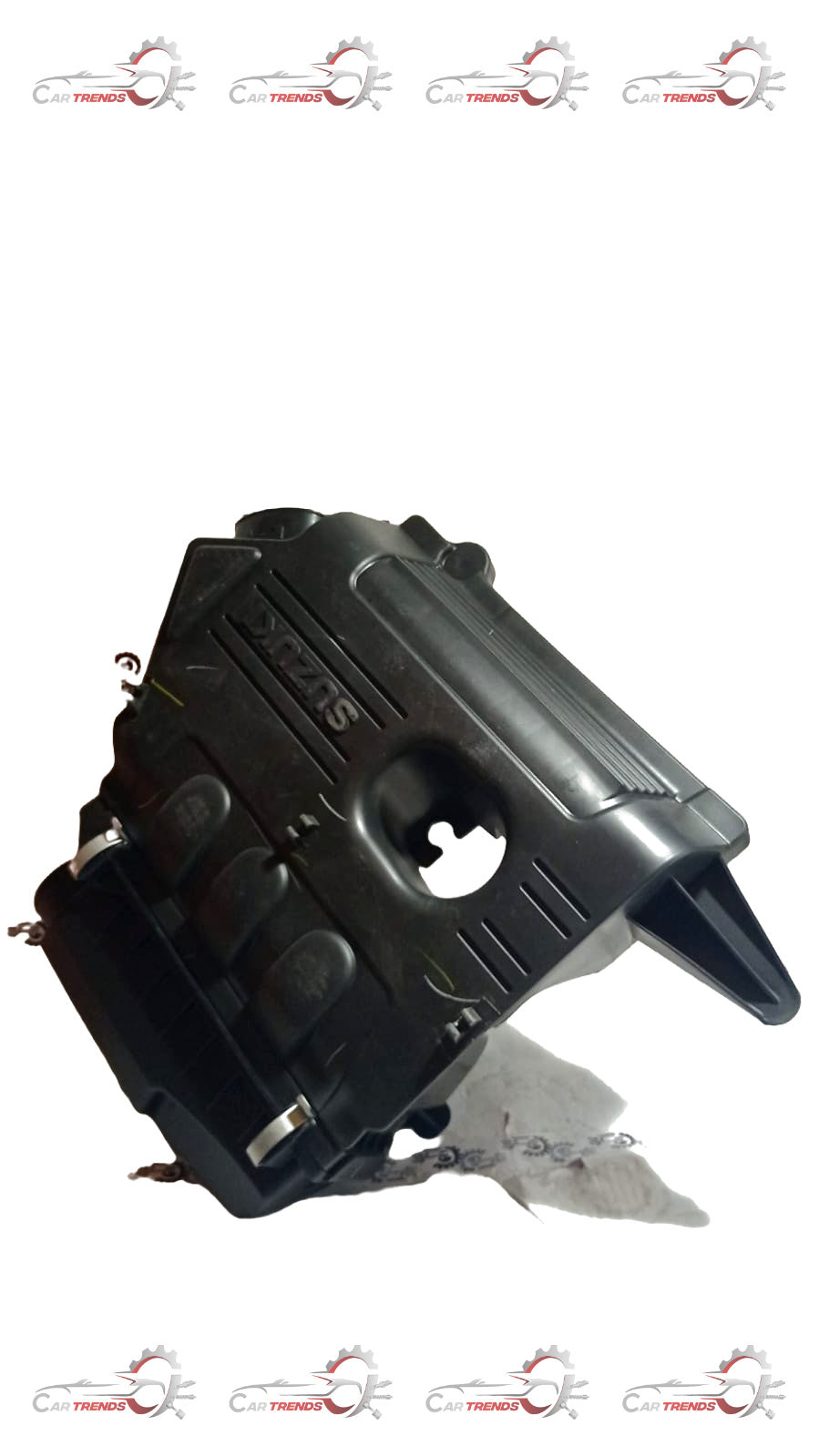 Maruti Suzuki Alto K10 air cleaner assembly, 13700M65L00, for engine air filtration, shown in close-up view.