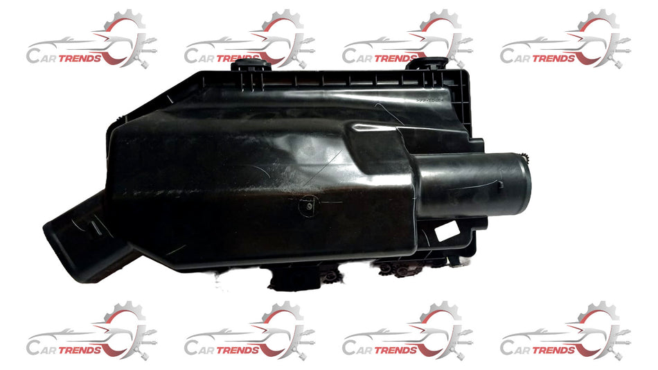 Maruti Suzuki air filter assembly for Ciaz vehicle, showing the clean, rectangular filter component with plastic frame.