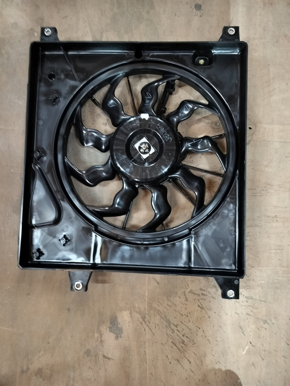Maruti Suzuki fan assembly for Spresso 2022 model, showing the engine cooling fan and related components.
