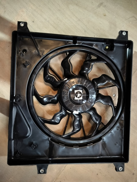 Maruti Suzuki radiator fan assembly for S-Presso, showing the black plastic fan and mounting components.