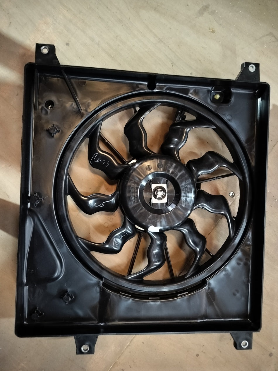 Maruti Suzuki radiator fan assembly for S-Presso, showing the black plastic fan and mounting components.