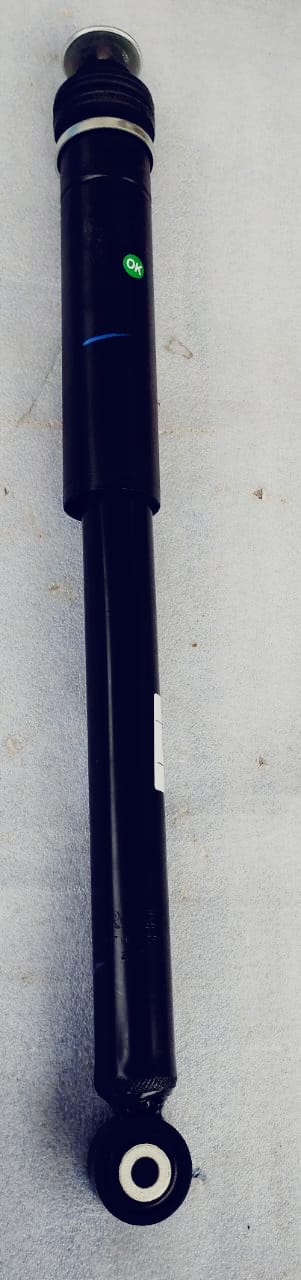 Rear shock absorber for Maruti Suzuki Baleno, part number 41800M68P30, showing the metal and rubber components of the suspension.