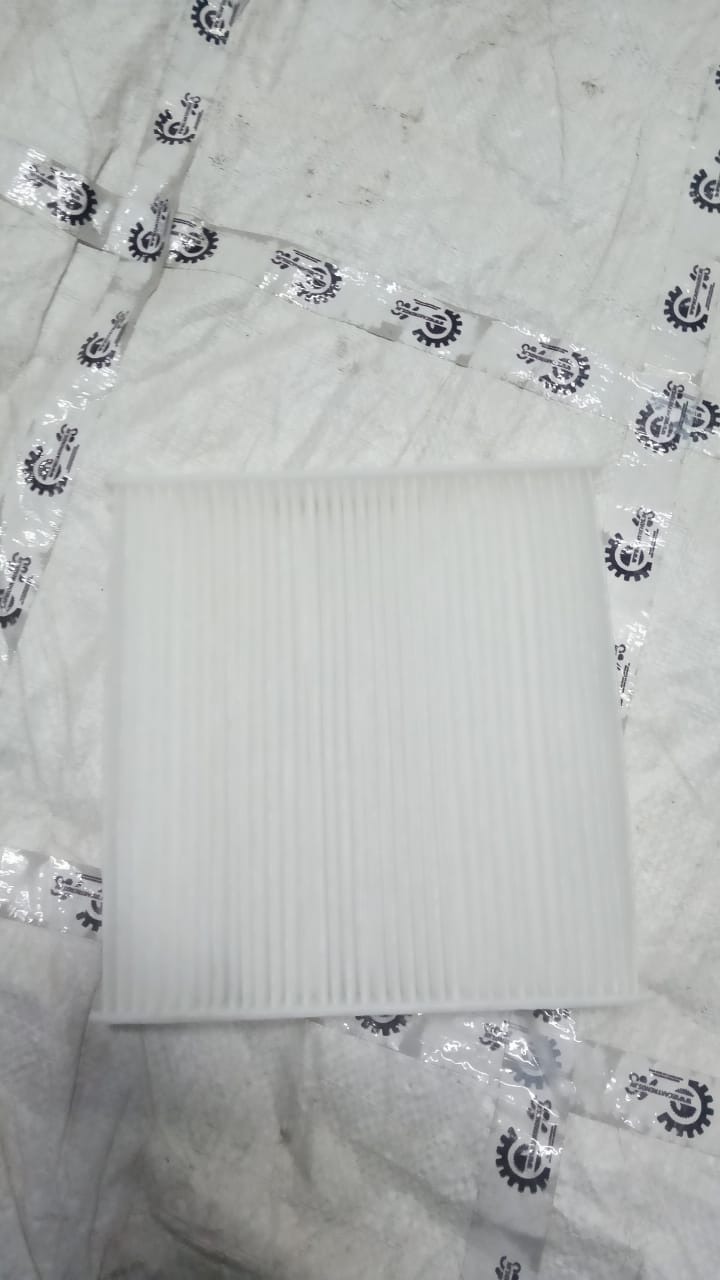 Maruti Suzuki Baleno AC filter replacement showing the black filter component for optimal air quality.