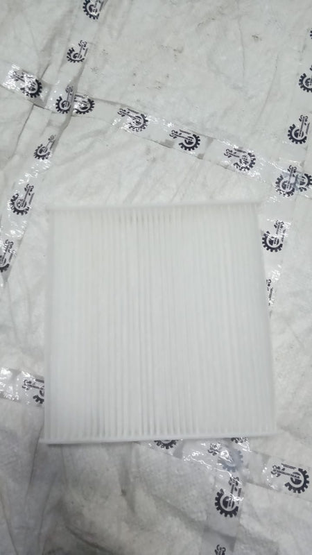 Maruti Suzuki Baleno AC filter replacement showing the black filter component for optimal air quality.