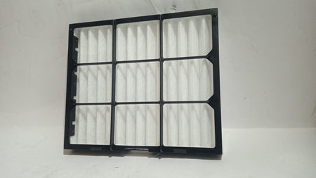 Maruti Suzuki Celerio AC filter showing its rectangular design and filter material for vehicle air conditioning system.