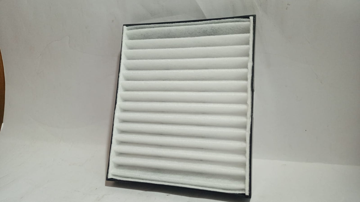 Maruti Suzuki AC filter for Celerio model, showing the black cabin air filter with pleated design.