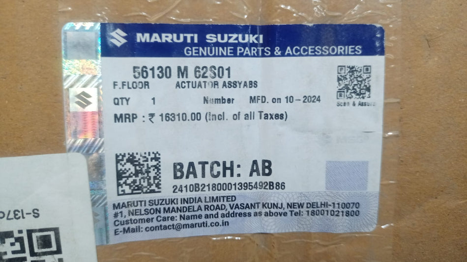 Maruti Suzuki actuator assembly part 56130M62S01 showing mechanical components and electrical connectors for vehicle system.
