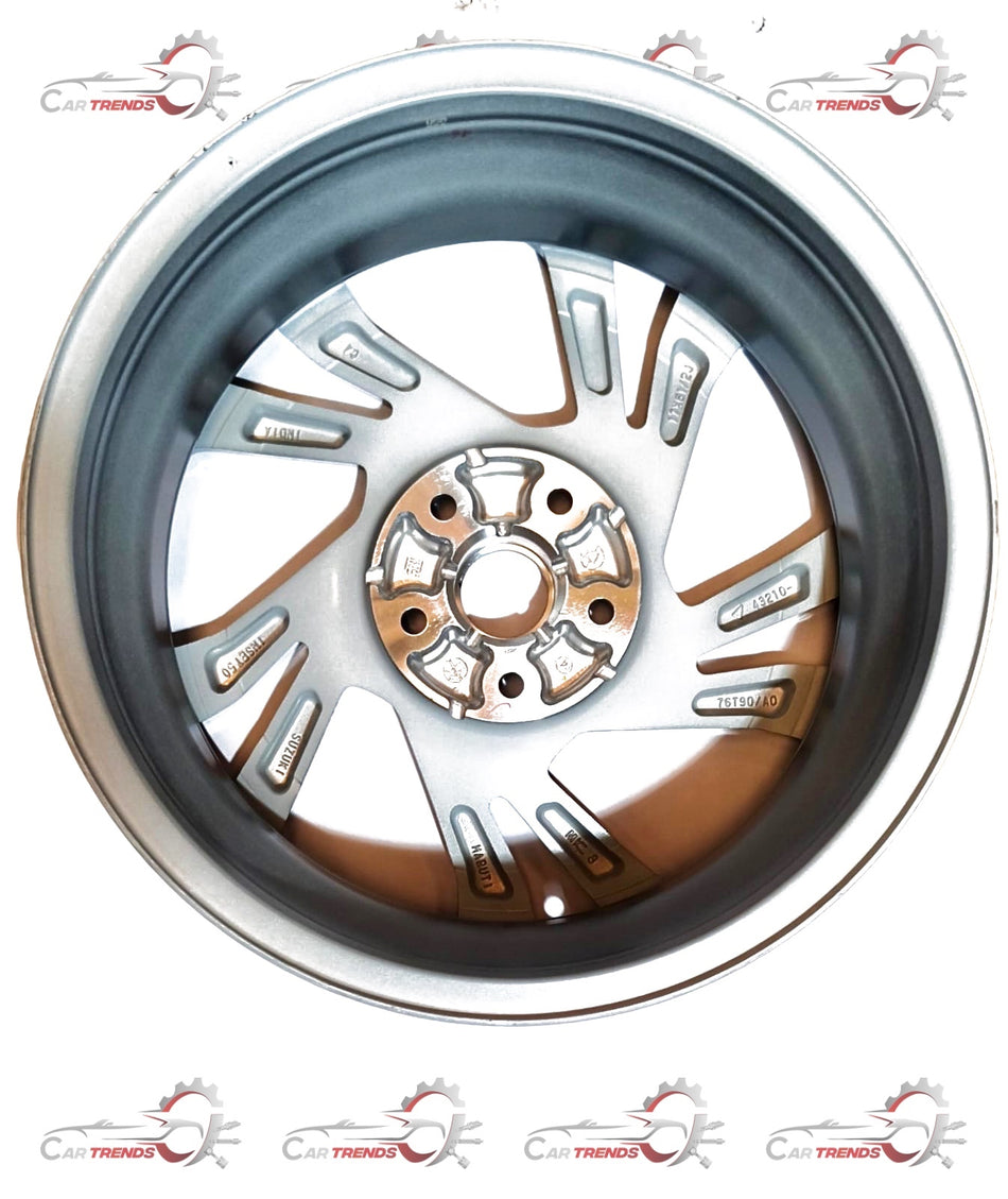 Maruti Suzuki alloy wheel for Grand Vitara, 2025 model, featuring a sleek silver design and multi-spoke pattern.