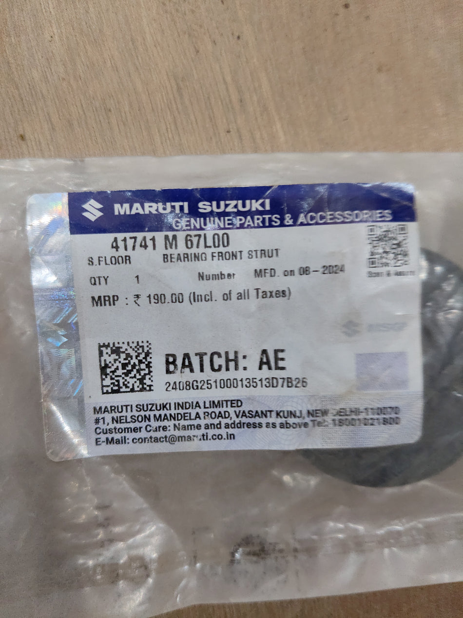 Maruti Suzuki front strut bearing 41741M67L00, automotive suspension component for vehicle stability and smooth ride.