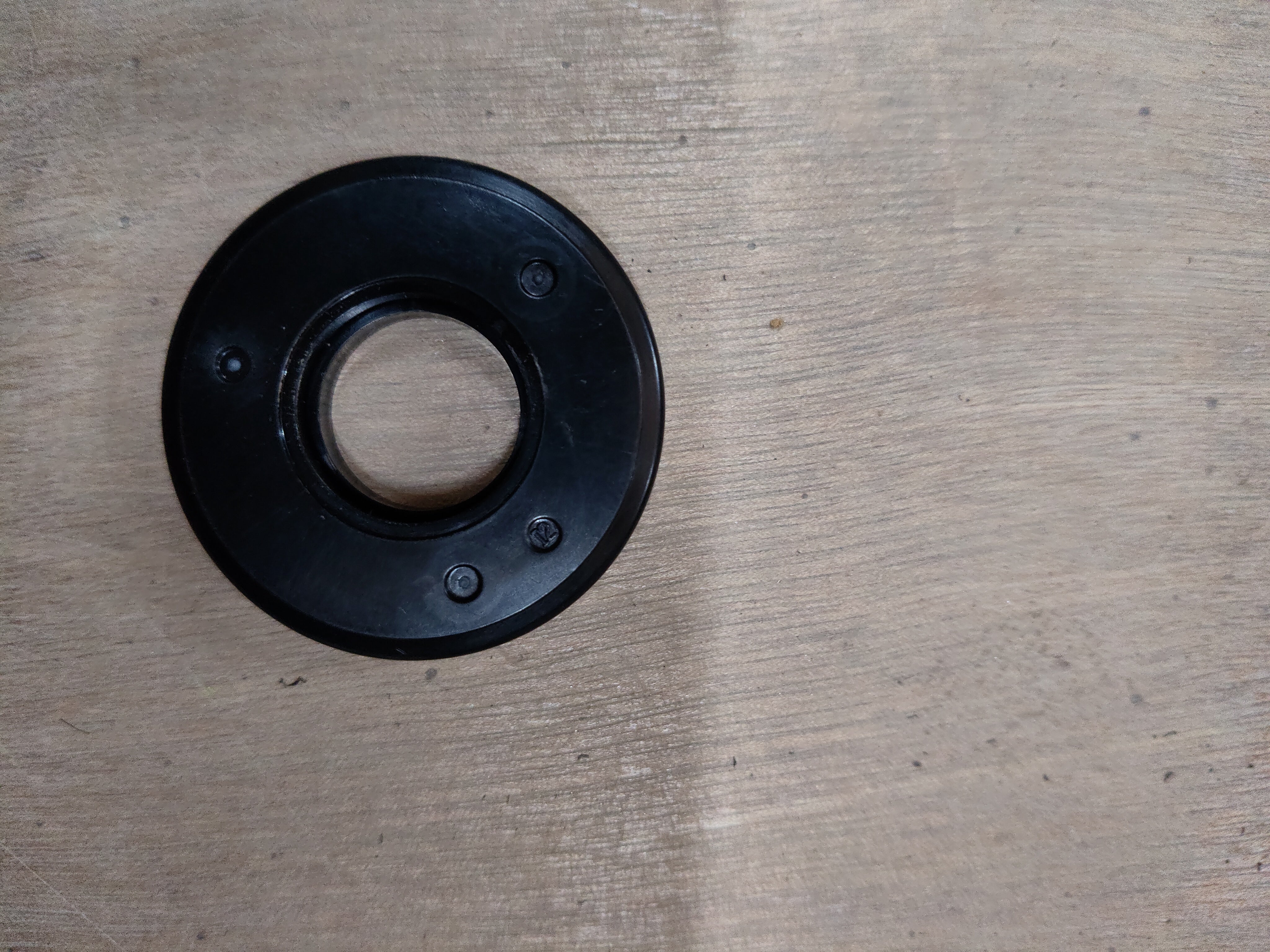 Maruti Suzuki front strut bearing part number 41741M67L00 showing a close-up of the automotive component