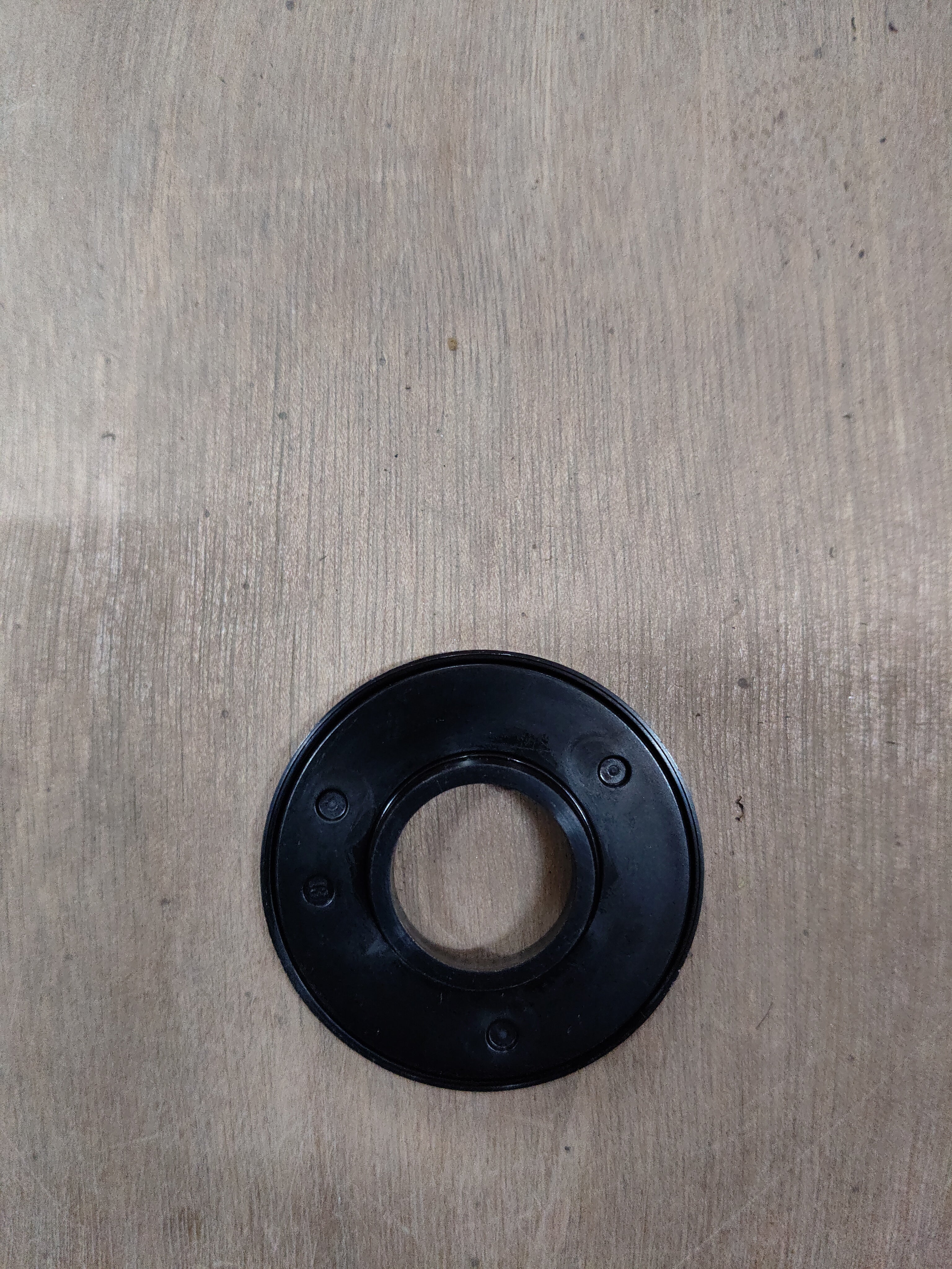 Maruti Suzuki front strut bearing, part number 41741M67L00, showing the metal component with mounting details.