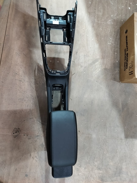 Maruti Suzuki floor console box, black interior storage compartment for car dashboard and center console area.