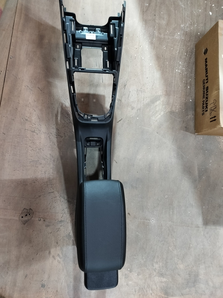 Maruti Suzuki floor console box, black interior storage compartment for car dashboard and center console area.