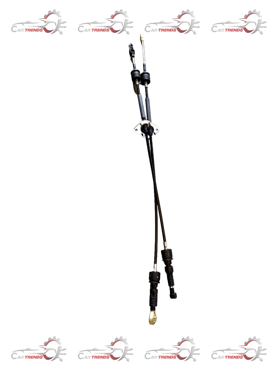 Maruti Suzuki shift and select control cable assembly, black plastic and metal components, for vehicle transmission system.