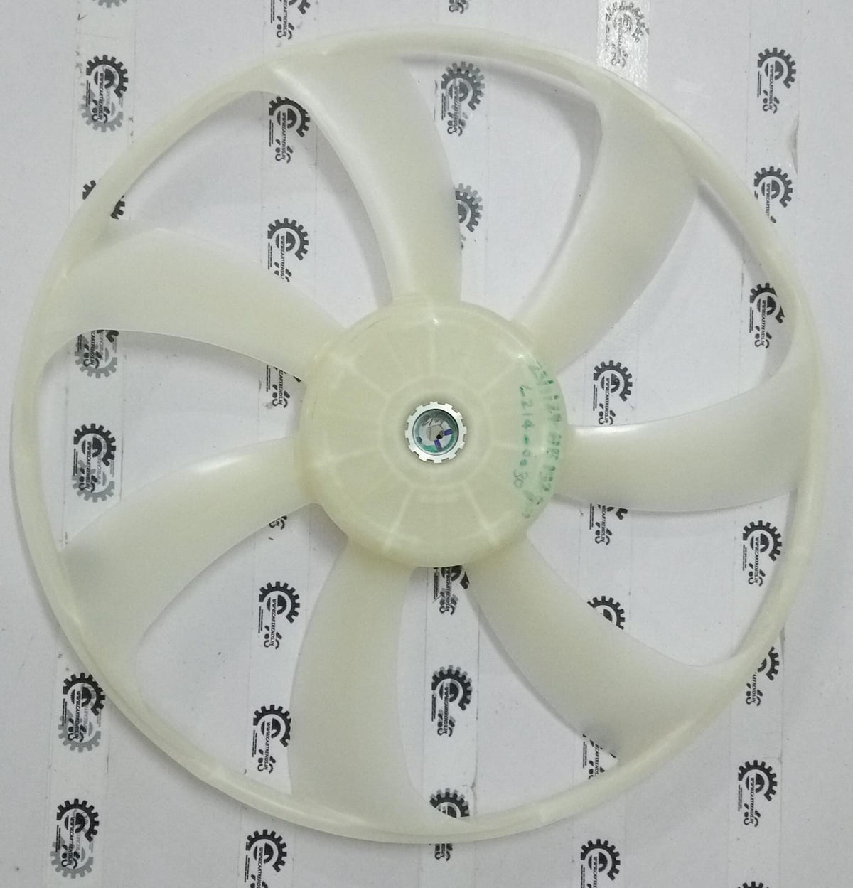 Maruti Suzuki cooling fan for Swift 2nd gen, showing the black plastic blade and mounting frame from a front view.