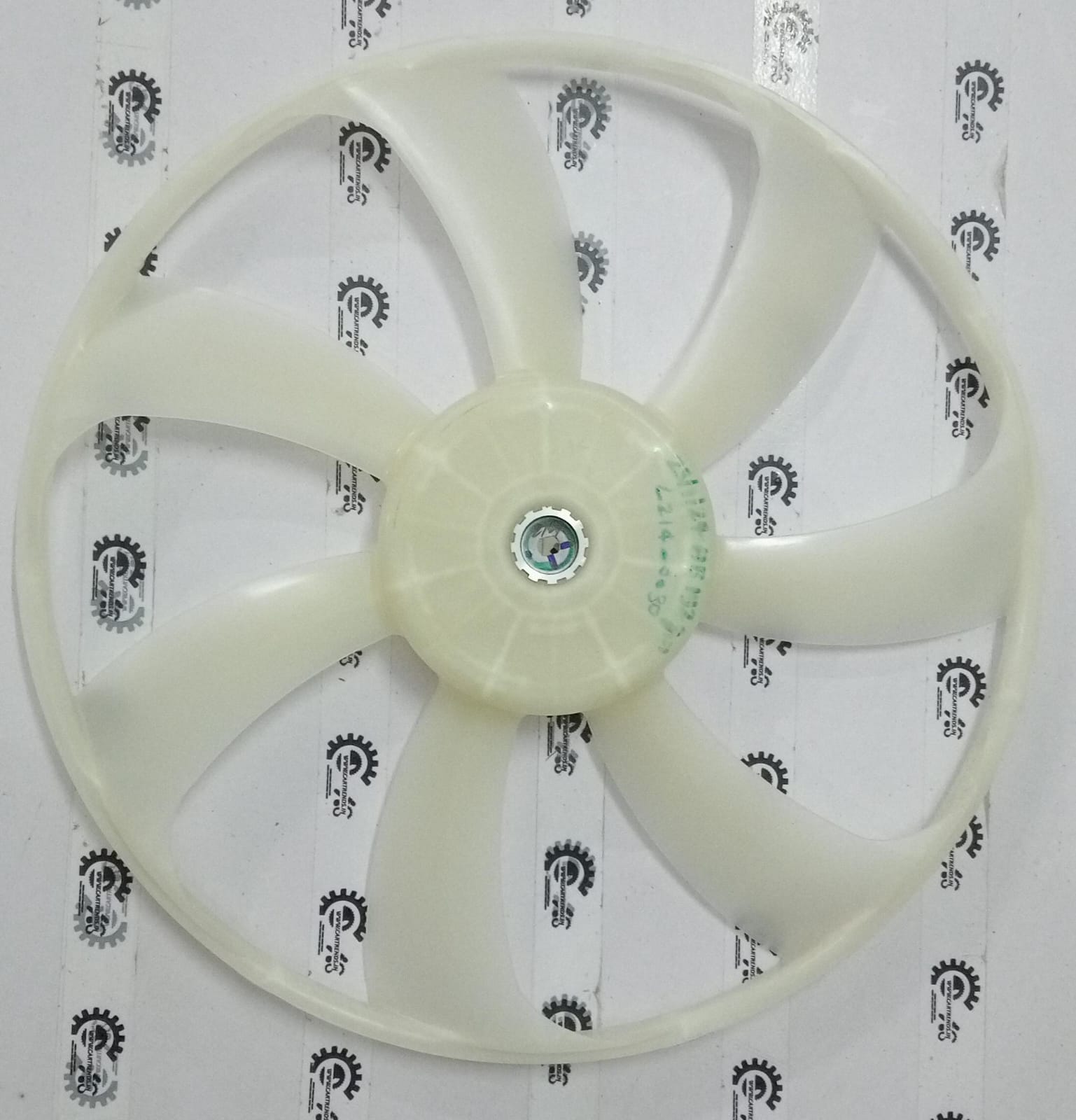 Maruti Suzuki cooling fan for Swift 2nd gen, showing the black plastic blade and mounting frame from a front view.