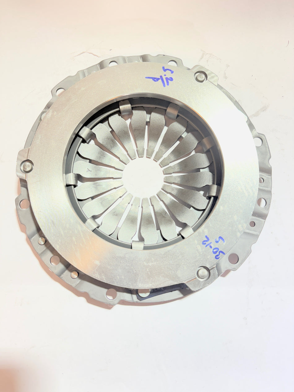 Maruti Suzuki clutch cover assembly for model 22100M68P20 showing the black clutch cover part with metal components.
