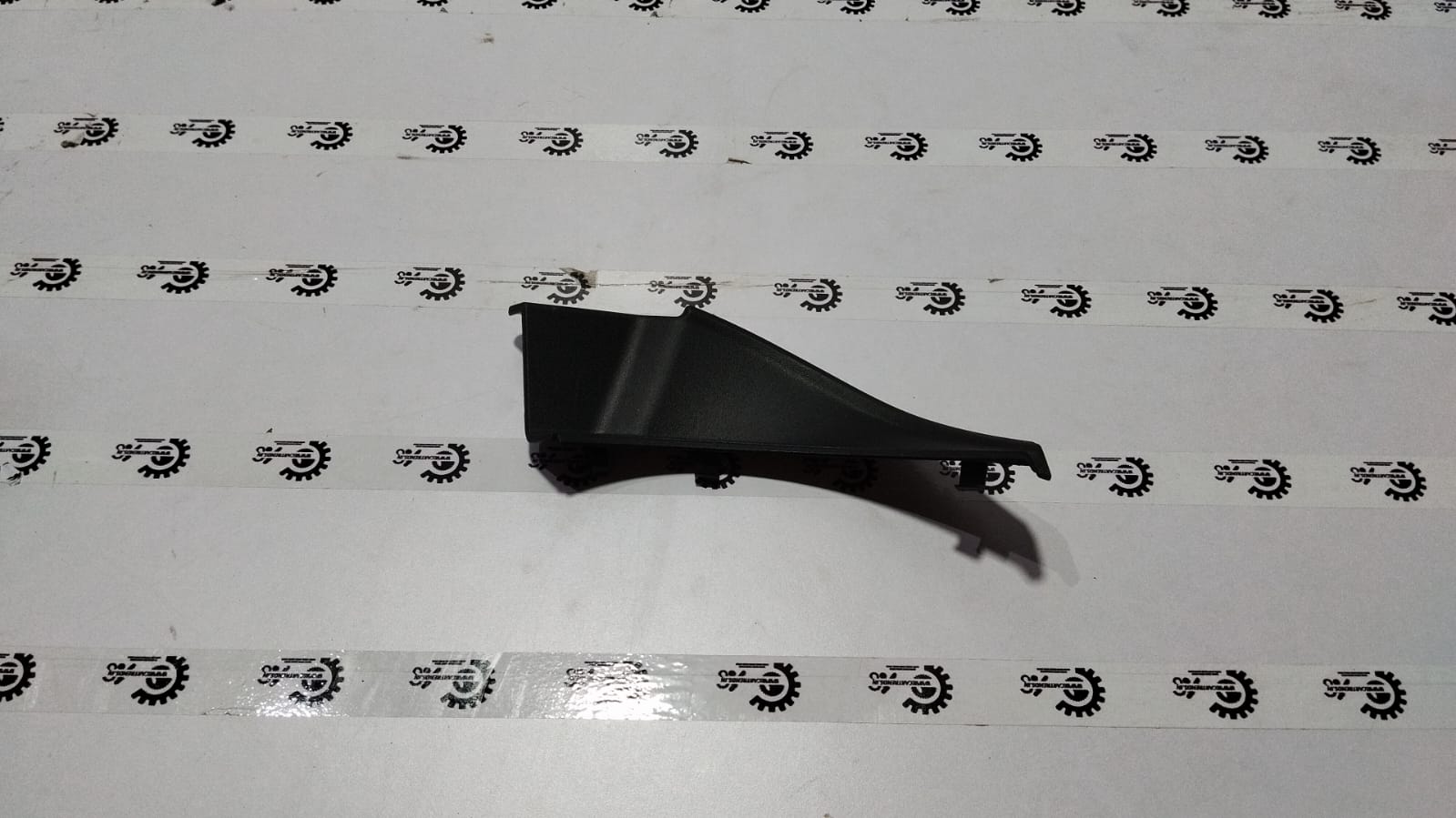 Maruti Suzuki cowl top garnish spresso RH side, vehicle part with black and chrome finish, mounted on side of car.