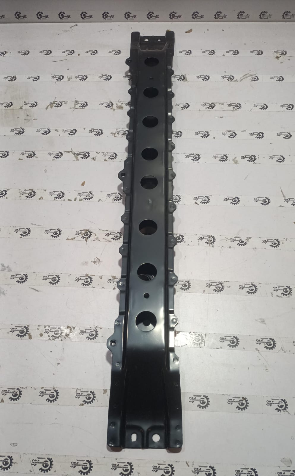 Front cross member for Suzuki Celerio, Maruti Suzuki vehicle part, showing the metal component with mounting points.